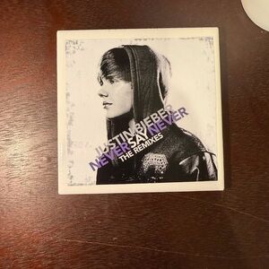 Justin Bieber "Never Say Never: The Remixes" CD Cover Art